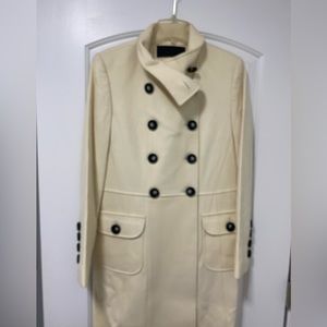 Woman coat size small ivory color with buttons on the front